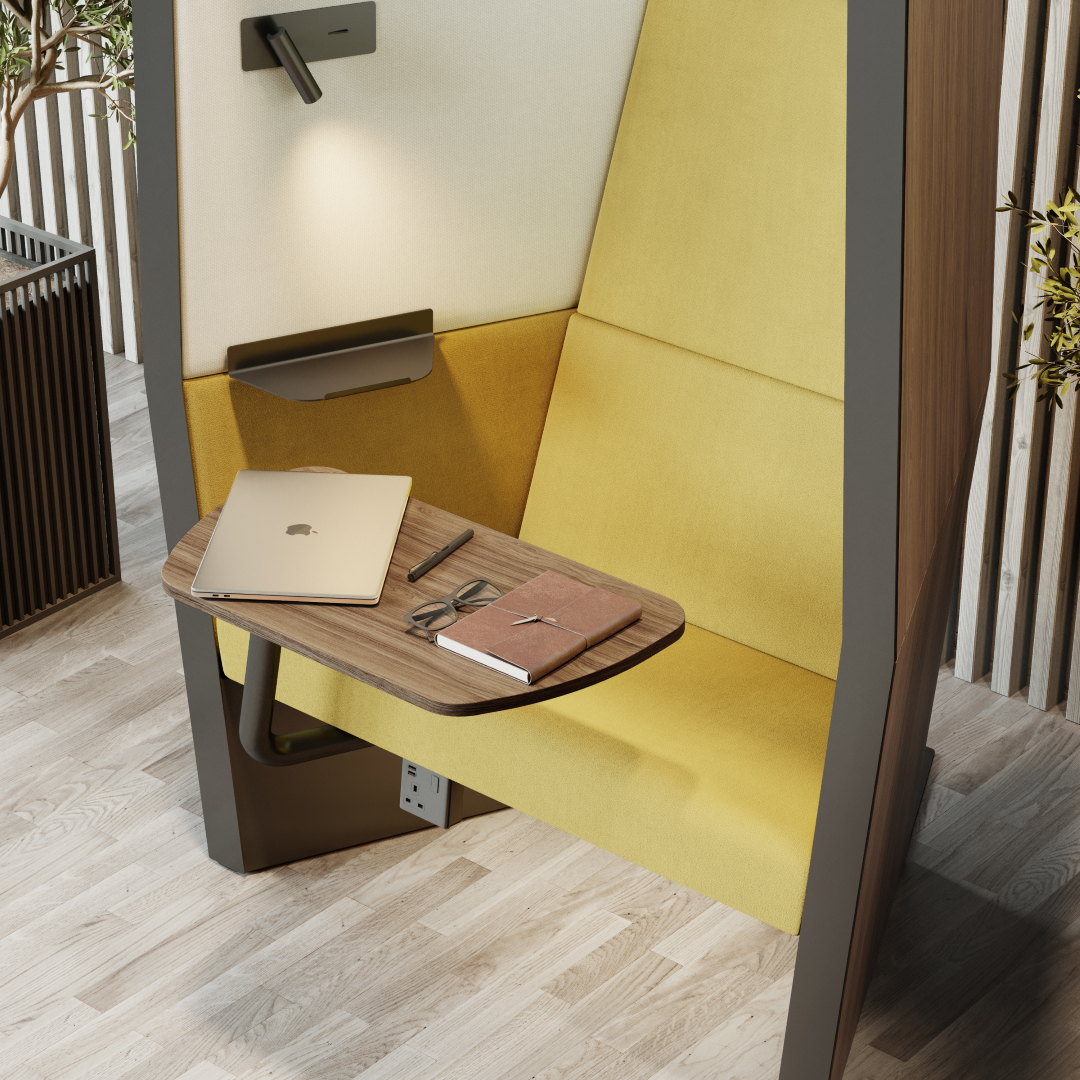 privacy office pod with a laptop on the seat